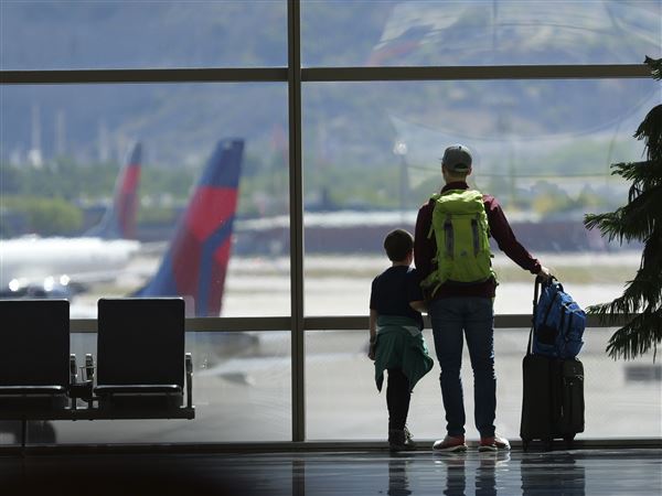 Proposed U.S. rule would ban airlines from charging parents additional fees to sit with their children